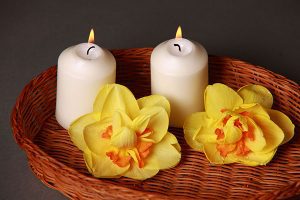 Picture of aromatherapy candles burning and flowers