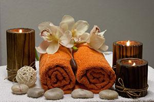 Picture of candles and towels that later you will be wrapped in to keep you warm.