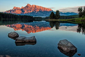 Picture of calm lake reflecting mountains