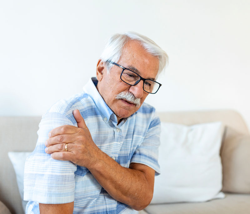 Older person with shoulder pain
