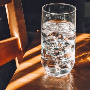 picture of water in a glass on a table