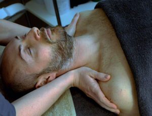 picture of man enjoying a blissful relaxing massage