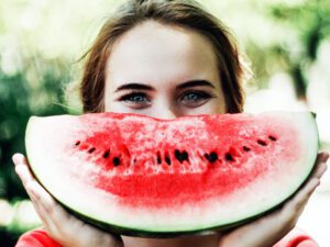 Big smile with watermelon very happy at feeling good