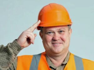 Happy builder after massage in a hardhat